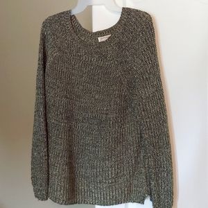 Green cable knit sweater.